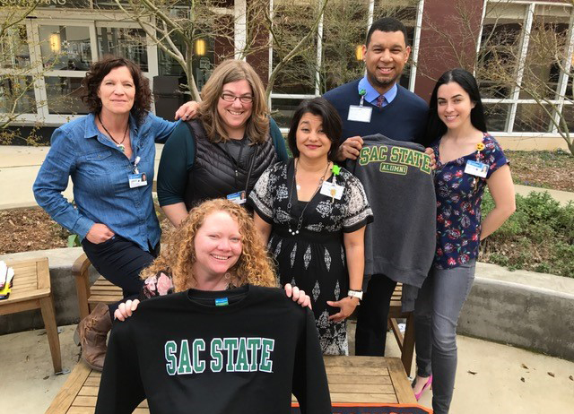 SAC State Alumni Posing